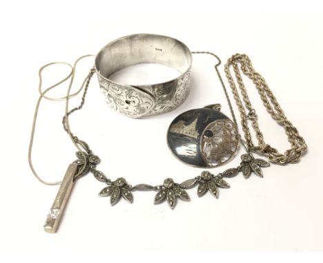 A mid 20th century Charles Horner silver bangle and other silver and white metal jewellery.
