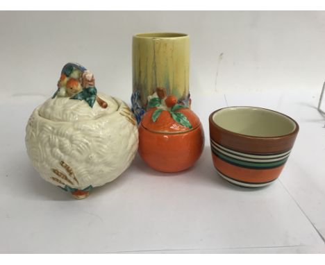 A Collection of Clarice cliff comprising two preserve jars and covers and two vases