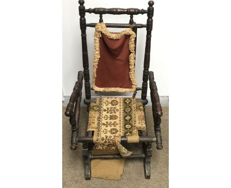 A child's bobbin wood rocking chair