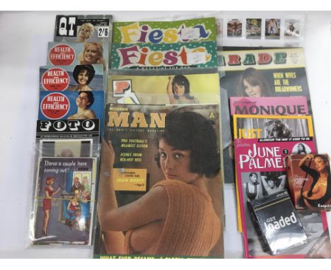 A box containing vintage glamour magazines and cards.