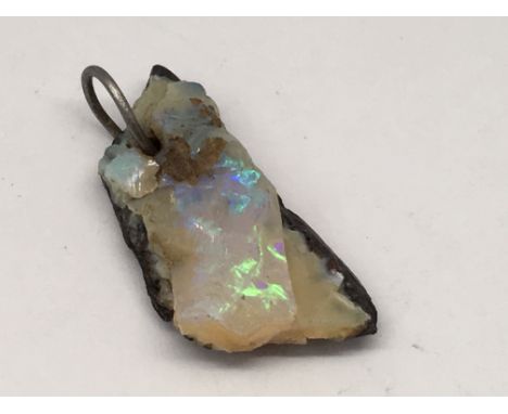 A piece of uncarved opal, approx 3cm long