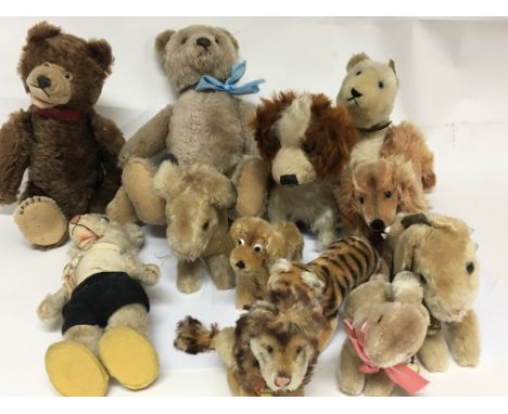 A collection of vintage 1960s and 1970s  Steiff animal figures and two bears some with orgional tags.