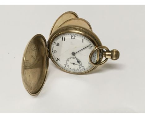A gold plated hunter pocket watch with an enamel dial.