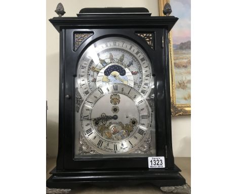 A Georgian style Christiaan Huygens  bracket clock with German chiming movement striking on gongs .47 cm