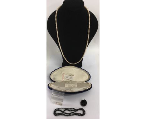 A group of pearls Including a cultured pearl necklace with 9ct gold clasp