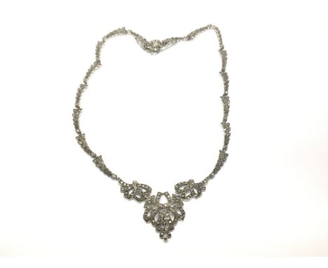 A vintage silver marquisite ribbon tie necklace. Total weight approximately 45 grams.