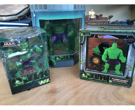 Incredible Hulk boxed movie figure , a bobble head and an alarm clock