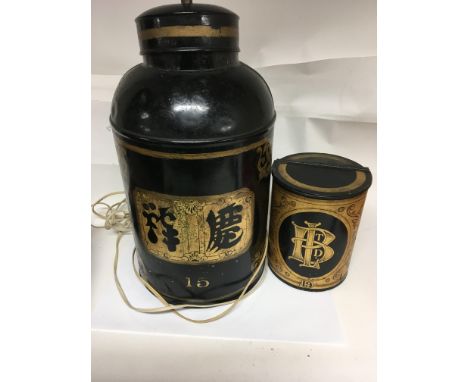 A Chinese tea caddy converted to a table lamp and one other tea container