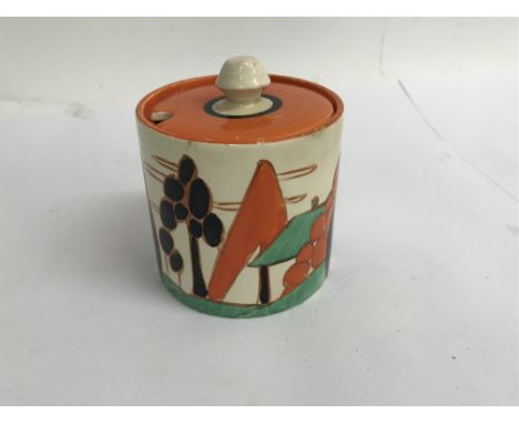 A Clarice cliff preserve jar and cover orange trees and house , paint loss no damage or restoration. 8 cm