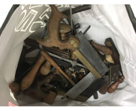 A bag of old woodworking tools including an R.Grove saw
