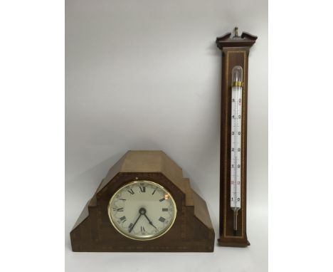 An Art Deco inlaid mantle clock, converted to battery, and a marquetry wall thermometer