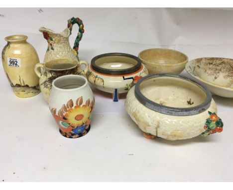 A collection of Clarice Cliff Celtic Harvest pattern ceramics, a Wilkinson Honeyglaze salad bowl and other ceramics.