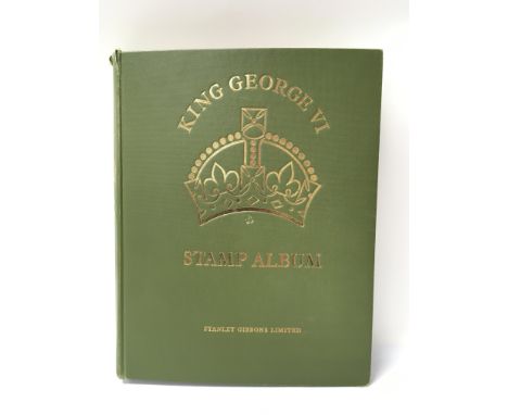 A King George VI Stanley Gibbons stamp album containing British and commonwealth stamps.