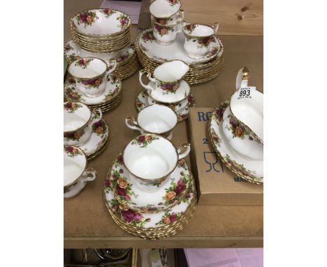 A set of royal Albert country rose , tea dinner ware comprising cups saucers bowls and dinner plates