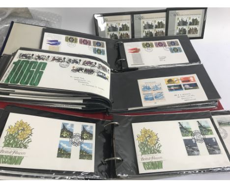 A collection of first day covers and stamp albums various and miniature stamps