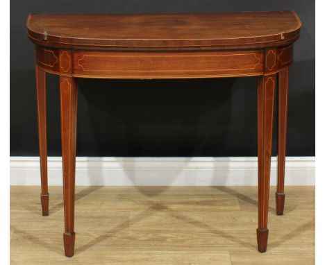 A Sheraton Revival mahogany D-shaped card table, hinged crossbanded top outlined with boxwood stringing enclosing a baize-lin