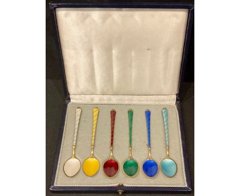 A set of six Danish silver-gilt and enamel coffee spoons, cased 