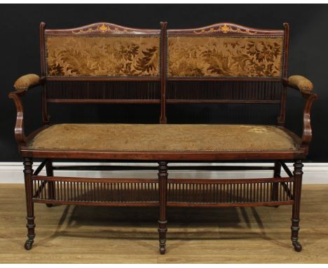 An Edwardian Sheraton Revival mahogany and marquetry sofa, stuffed-over upholstery, 90.5cm high, 129.5cm wide, the seat 112cm