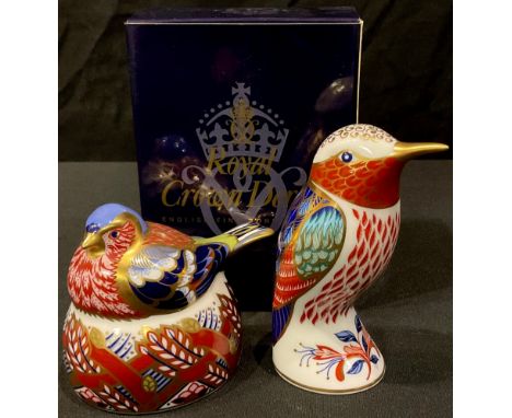 A Royal Crown Derby Nesting Chaffinch paperweight, gold stopper, first quality, boxed; a Royal Crown Derby  Humming bird pape