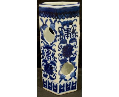 A Chinese hexagonal lantern, painted in tones of underglaze blue with bats, symbols, flowers and leaves, 28cm high 