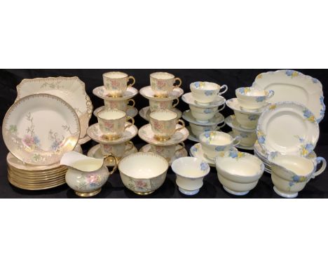 A 1930's Tuscan China gilded floral tea service for ten comprising cake plate, side plates, cream jug, sugar bowl, cups and s