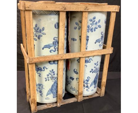 A pair of Chinese blue and white stick stands, 61cm high, in wooden packing crate 