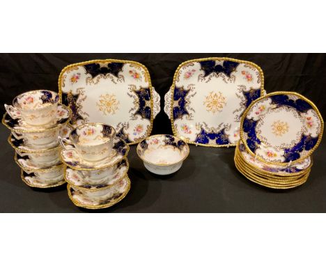 A Coalport batwing part tea service comprising  cups, saucers, side plates and cake plates 