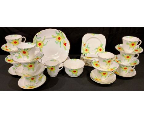 A 1930's Taylor and Kent "Narcissus" pattern part tea service, comprising cups, saucers, side plates and tea/cake plates (qua