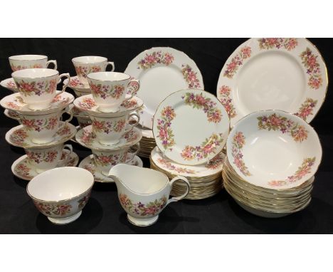 A Colclough floral pattern dinner and tea service for eight comprising dinner plates, salad plates, side plates, dessert bowl