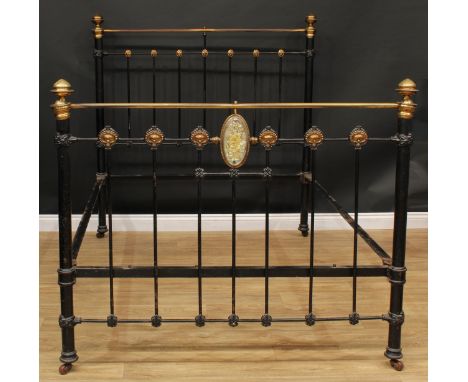 A brass and painted bed, the headboard 146cm high, internal size 192cm x 136cm 