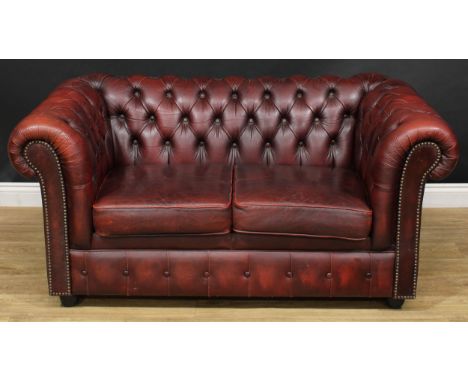 A 'Chesterfield' office reception sofa, deep-button upholstery, squab cushions, 70cm high, 146cm wide, 84cm deep, the seat 93