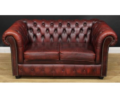 A 'Chesterfield' office reception sofa, deep-button upholstery, squab cushions, 70cm high, 146cm wide, 84cm deep, the seat 93