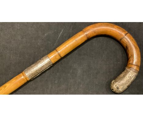 An Edwardian silver mounted walking stick 