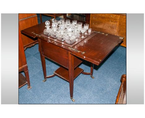 An Edwardian Mahogany 'Surprise' Pop Up Drinks Cabinet By Mappin & Webb The Fitted Interior Containing Eight Decanters Twelve