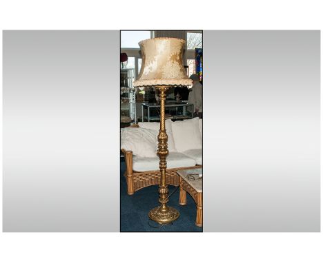 Carved Gilt wood Standard Lamp, with a Baluster Carved Central Support, with Spiraling Colours. Terminating on a Round Rococo