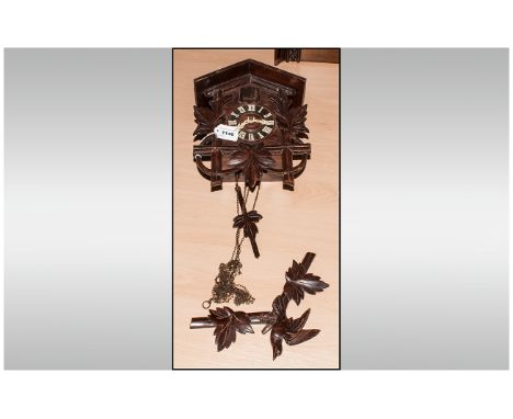 Hanging Black Forest Cuckoo Hanging Wall Clock, Carved to top with a Bird Amongst Branches, The Pendulum Carved as a Leaf. 16