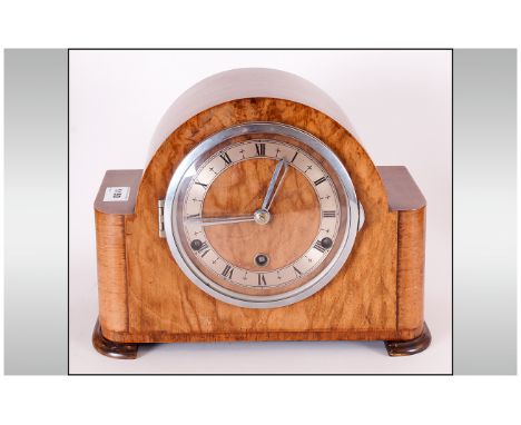 Westminster Chimes Walnut 1930's Mantle Clock, with a Silvered Chapter Ring and Shaped Top Case and Sides. 