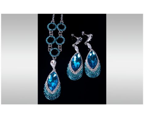 Turquoise Crystal Pear Drop Pendant Necklace and Earrings, the pendant and earrings each having a large marquise cut turquois