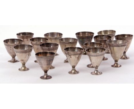 Set of 16 circa 1920s Ottoman Empire coffee cups of egg cup shape with banded engraved foliate decoration and beaded edges, T