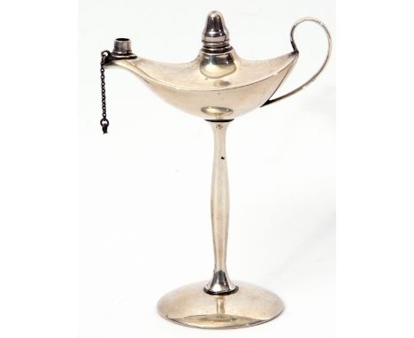 Unusual early 20th century Continental white metal table lighter with Aladdin's lamp shaped top to a panelled baluster stem a