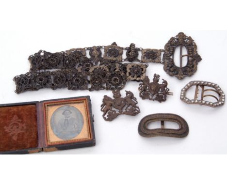 Antique pressed metal panelled belt and buckle, Georgian paste shoe buckle and one other oval metal example, two military bad