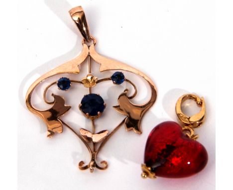 Mixed Lot: 9ct stamped open work pendant featuring three graduated blue stones, together with a red enamel pendant/charm in y