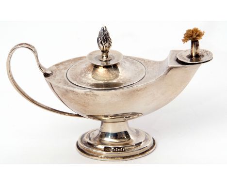 George V table lighter in the form of an Aladdin's lamp with scrolled handle, loaded circular foot, Birmingham 1916, by Hamil