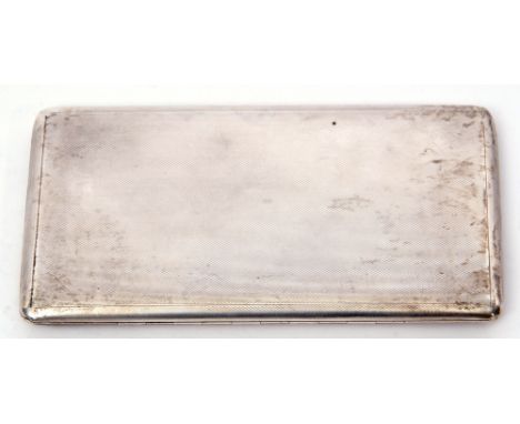 George VI cigarette case of engine turned rectangular form with chamfered edges, with slide to open hinge, gilt interior, 16c