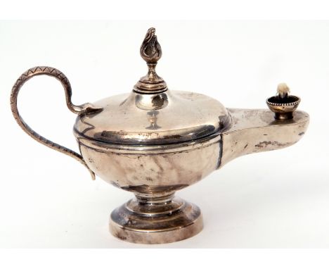 George V table lighter in the form of an Aladdin oil lamp with serpent handles and flambeau finials, London 1928 by The Golds