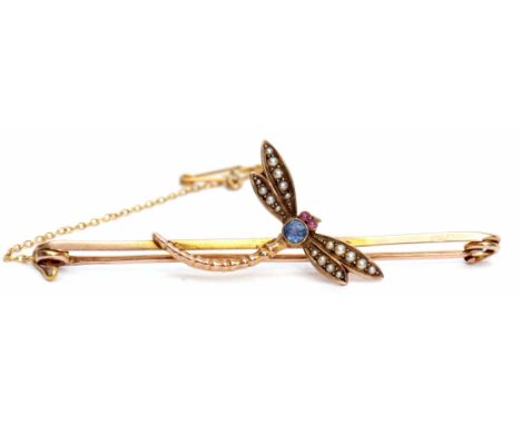 Late 19th century dragonfly brooch, circa 1890, the abdomen set with a circular cut sapphire, the head with two small cabocho