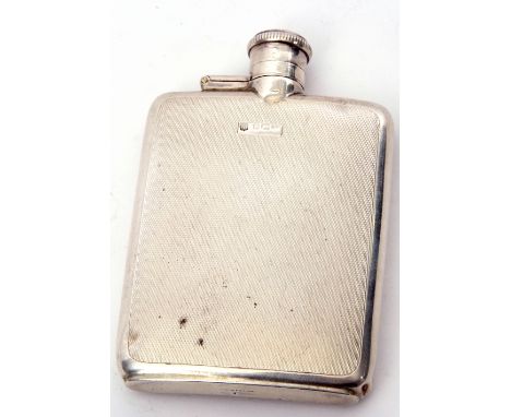 George VI small spirit flask of curved rectangular form with bayonet hinged lid, engine turned decoration to back and front (