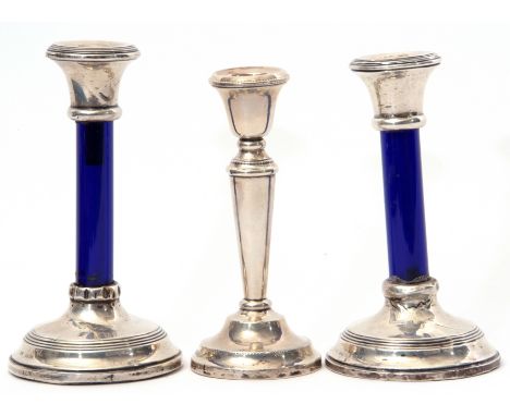 Pair of George V silver mounted and blue glass stemmed dressing table candlesticks on reeded and loaded circular bases, Birmi