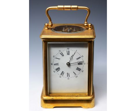 A FRENCH CARRIAGE CLOCK with white enamel Roman dial and Arabic five minutes, platform cylinder escapement and gilded cornich