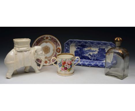 A COLLECTION TO INCLUDE A WHITE CERAMIC MODEL OF AN ELEPHANT with Howdah, 19cm high, a two handled loving cup, a Russian porc